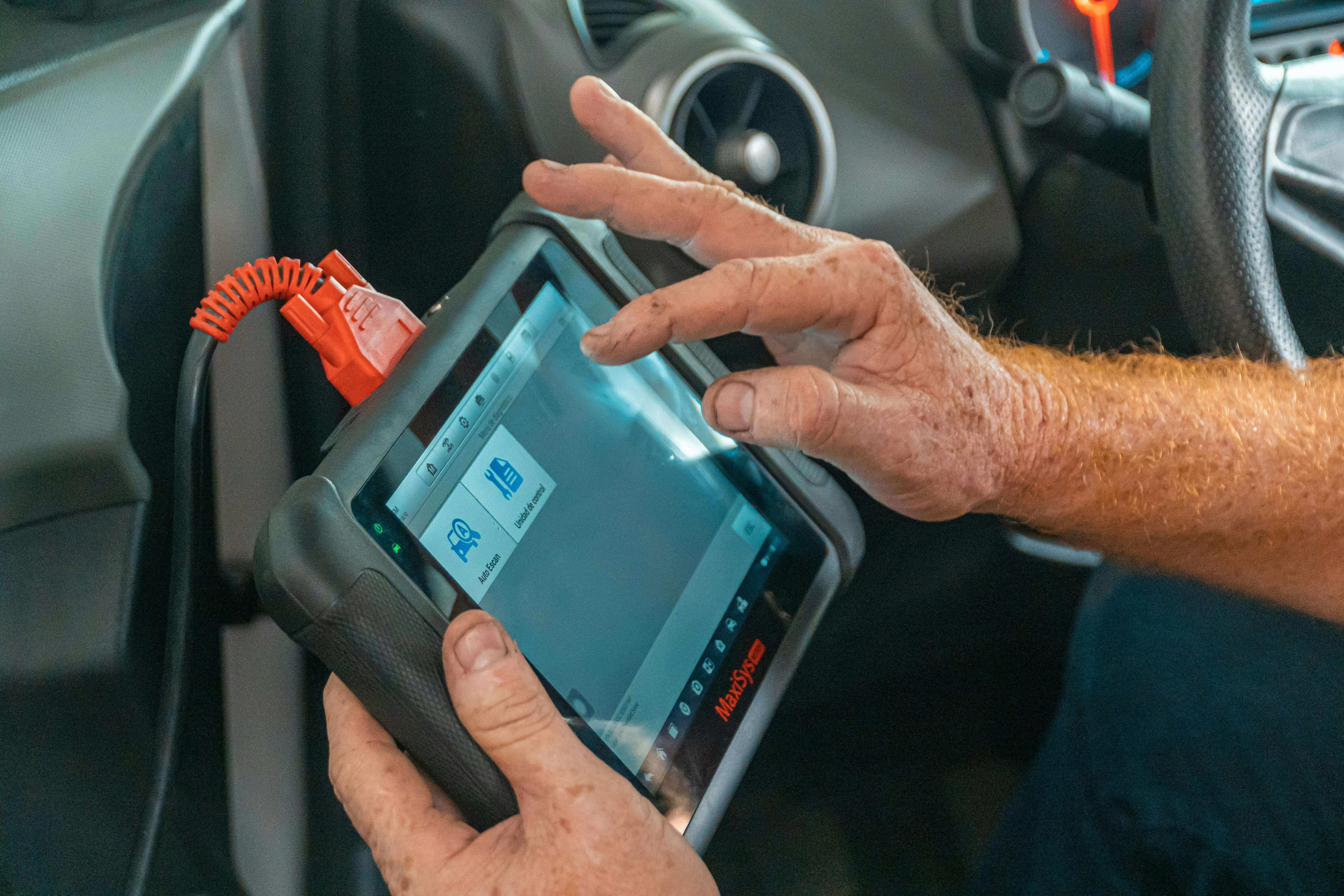 Diagnostic scan tool plugged into an HGV in the workshop, JG Technical Ltd